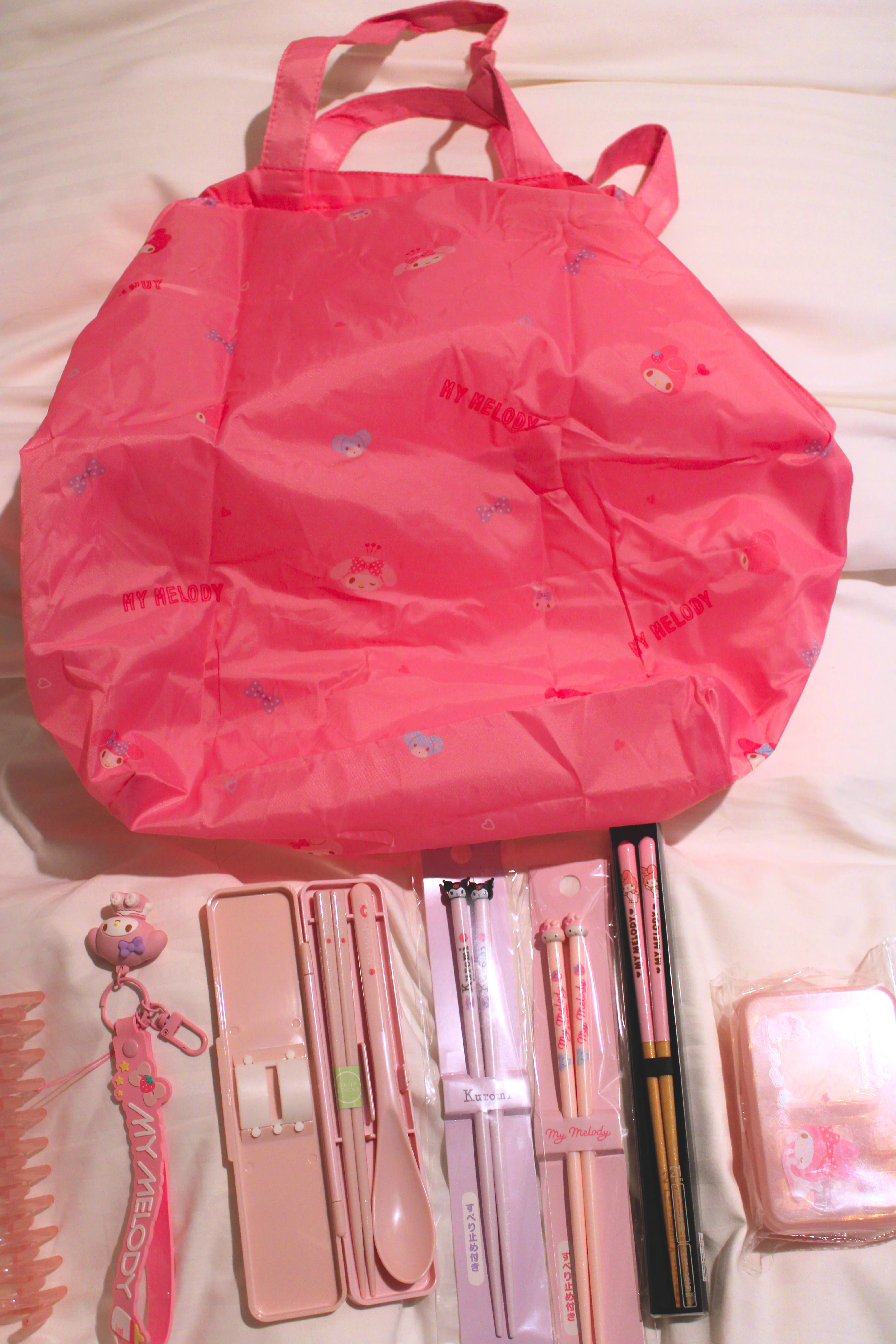 A picture of the bag I got from the Sanrio store with the other things I got below it